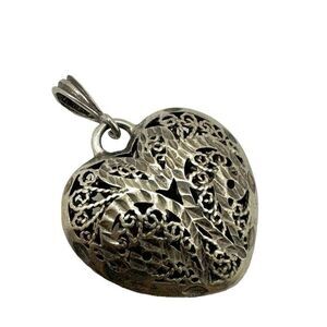 Sterling silver vintage hollow ornate  heart pendant